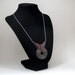 AS SEEN IN Beaded Necklace - Ceramic Charcoal Gray Donut Focal - Maroon Dark Red Brown by randomcreative on Etsy