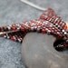 AS SEEN IN Beaded Necklace - Ceramic Charcoal Gray Donut Focal - Maroon Dark Red Brown by randomcreative on Etsy