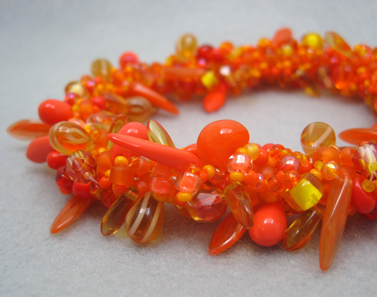 Beaded Bangle Bracelet - Tangerine Orange Explosion by randomcreative on Etsy