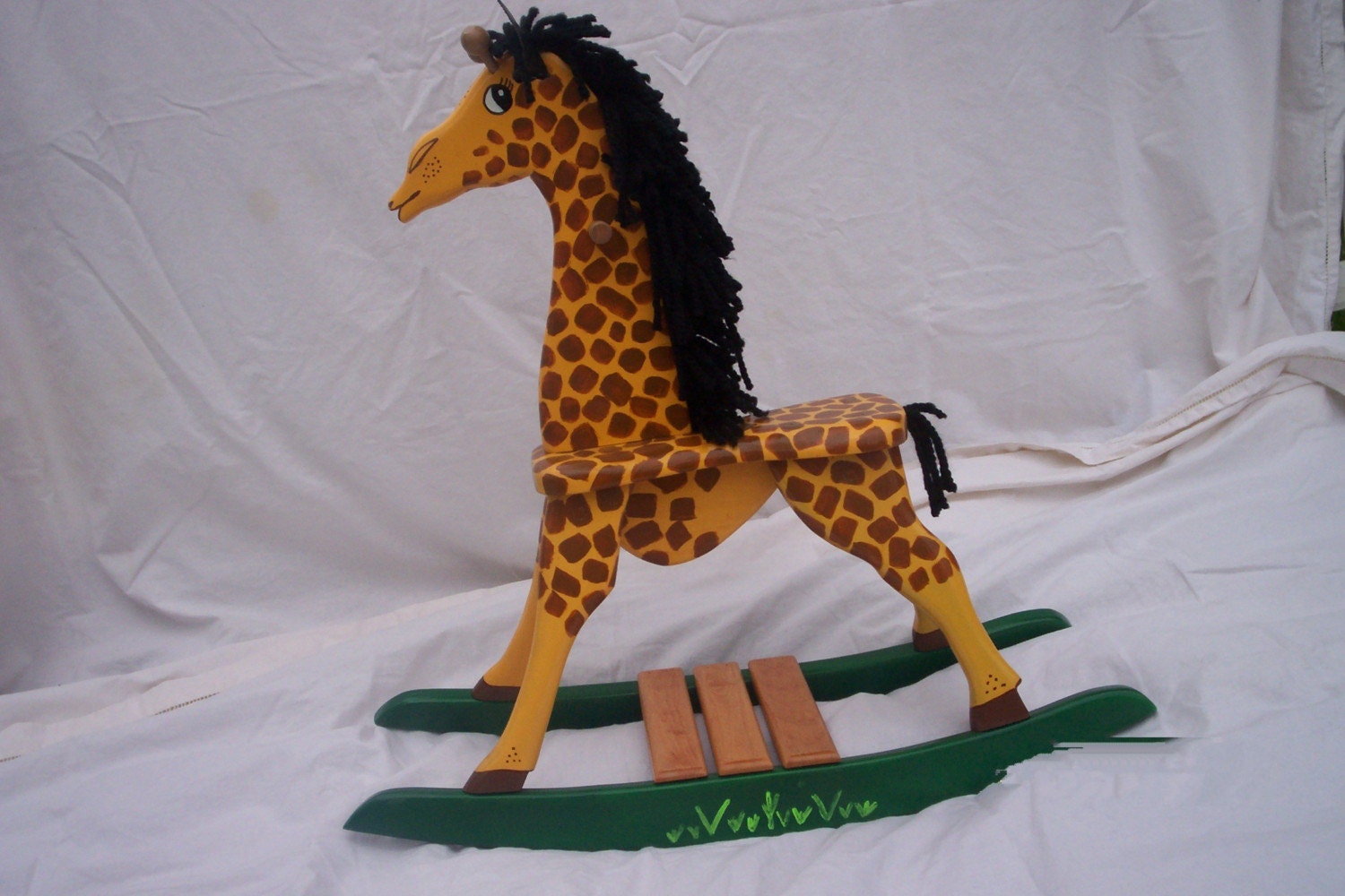 wooden rocking horse or giraffe