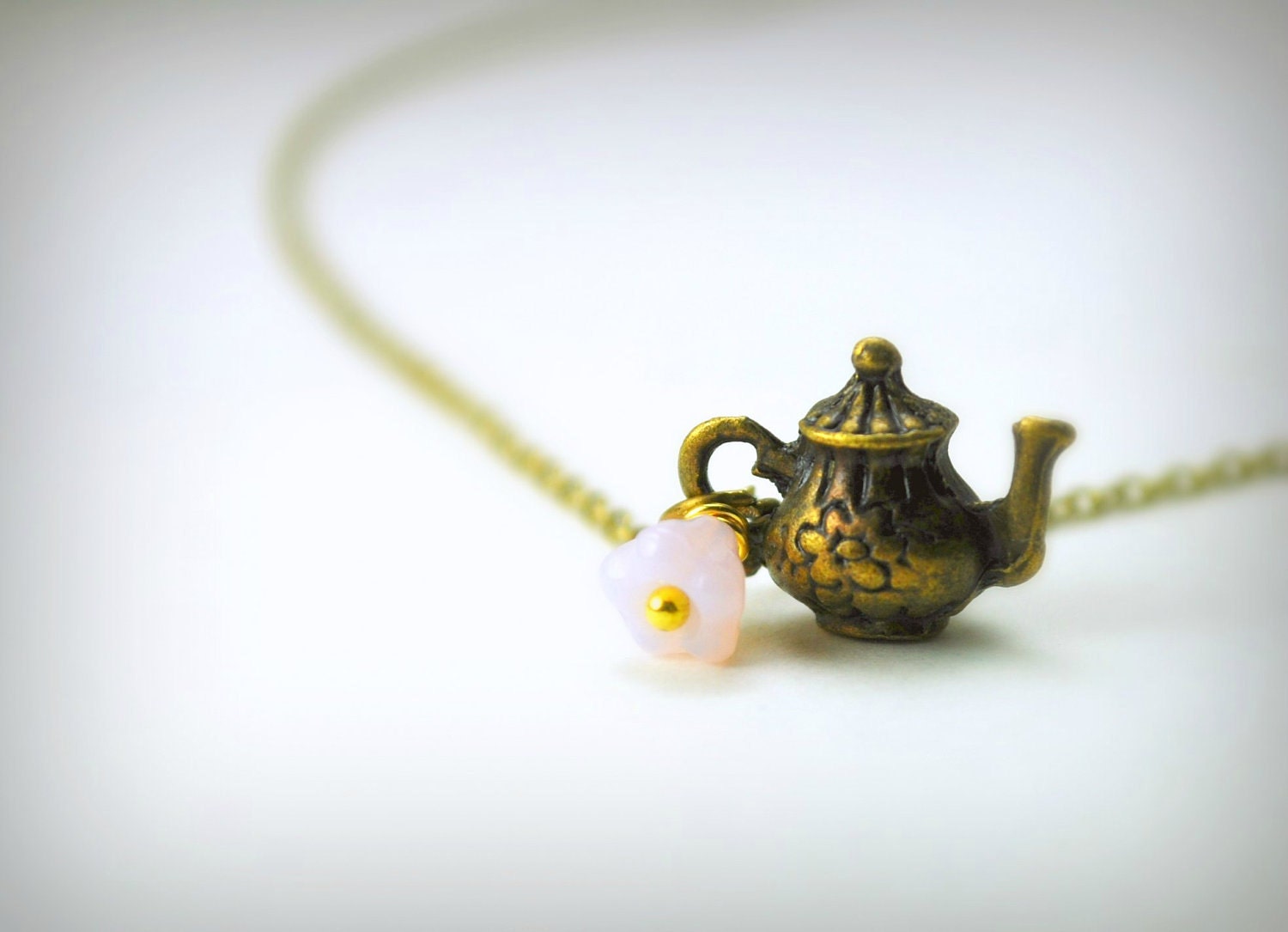 A Pot and a Flower. Tea Pot Necklace in Bronze. Flower Necklace. Dainty Everyday Jewelry.