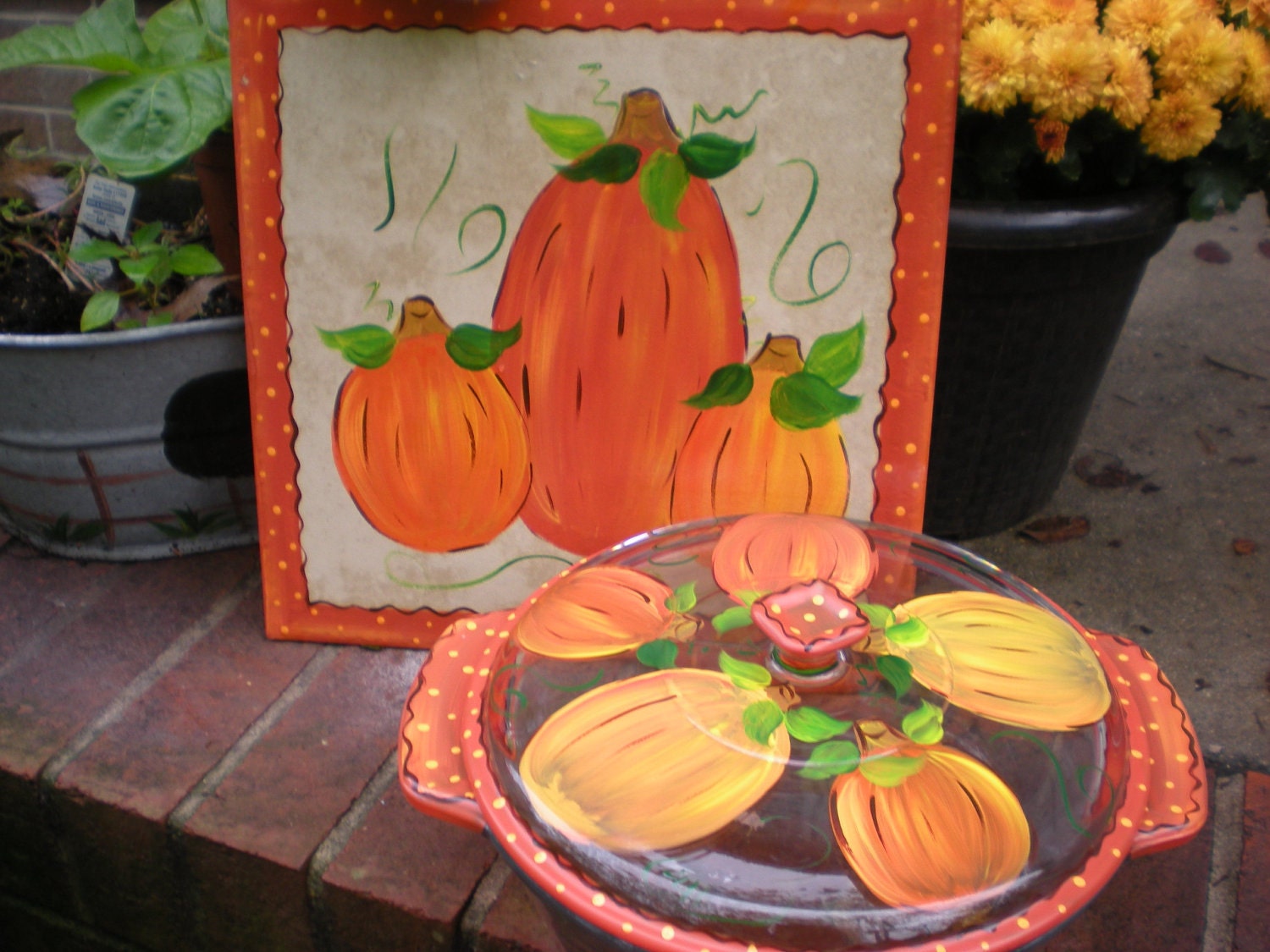 Hand painted autumn pumpkin casserole serving dish and ceramic tile trivet