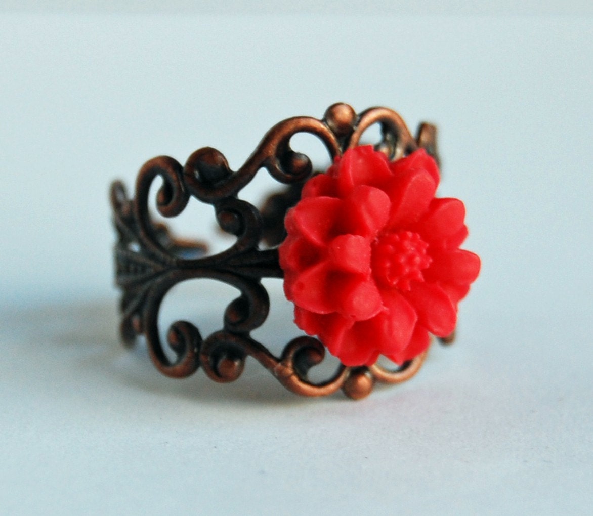 Antique bronze filigree ring with red flower