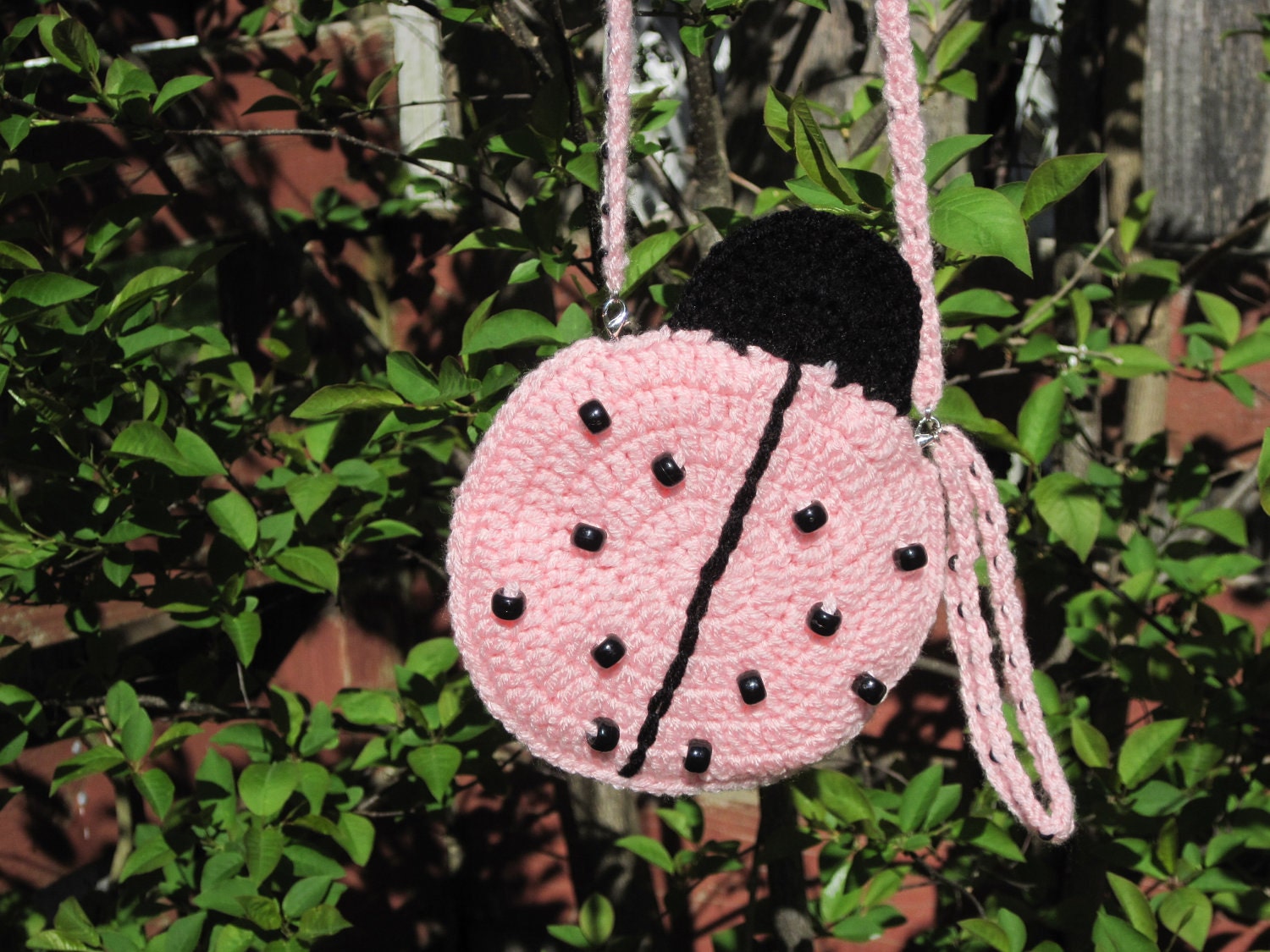 Ladybug media pouch / purse / wristlet,  pink with two straps and three compartments.  perfect as a summer purse.