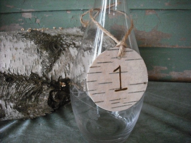 Set of 30 hanging Birch bark circles engraved with a table number for your nature themed wedding or event.