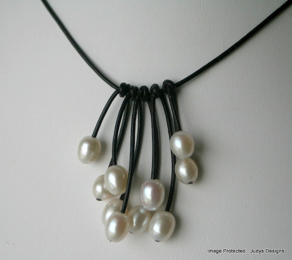 White pearl leather necklace, cascade style on brown leather
