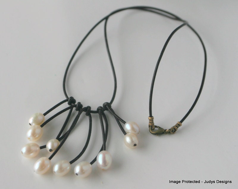 White pearl leather necklace, cascade style on brown leather