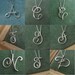 Calligraphy Initial Necklace in sterling silver