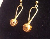 Brown and gold Kazuri bead dangle earrings