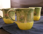 A set of four Coffee Mugs