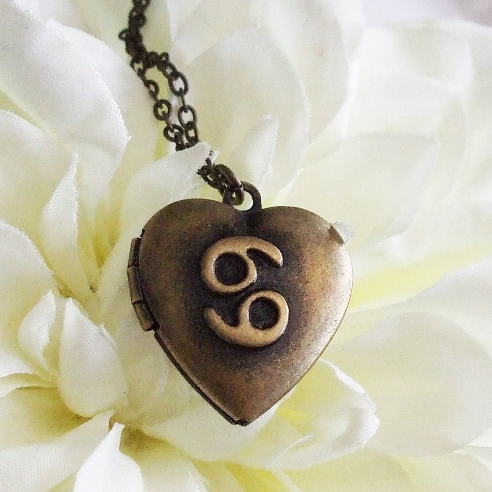 horoscope heart locket necklace . bronze . cancer