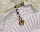 tiny heart necklace . bronze . simplicity