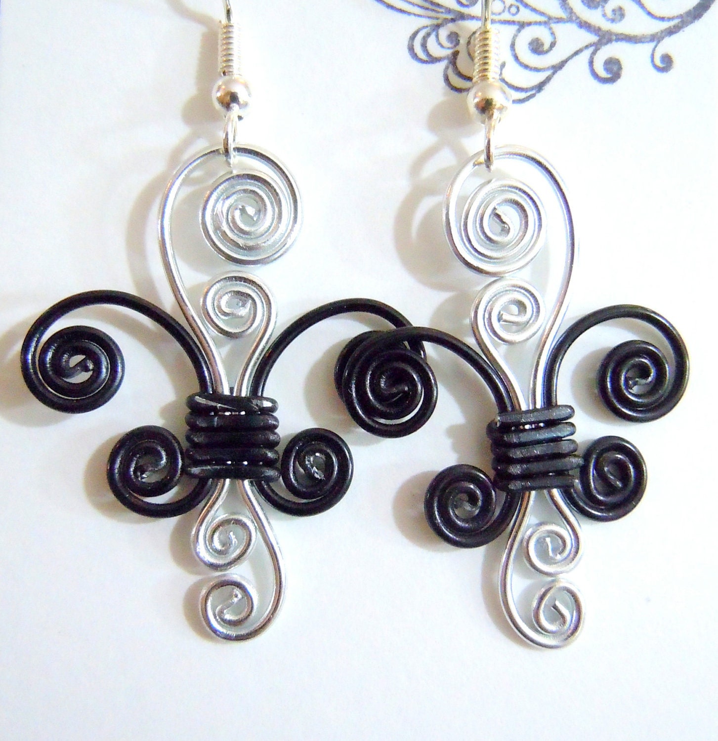 Fleur de lis Dangle Earrings in Black and Silver