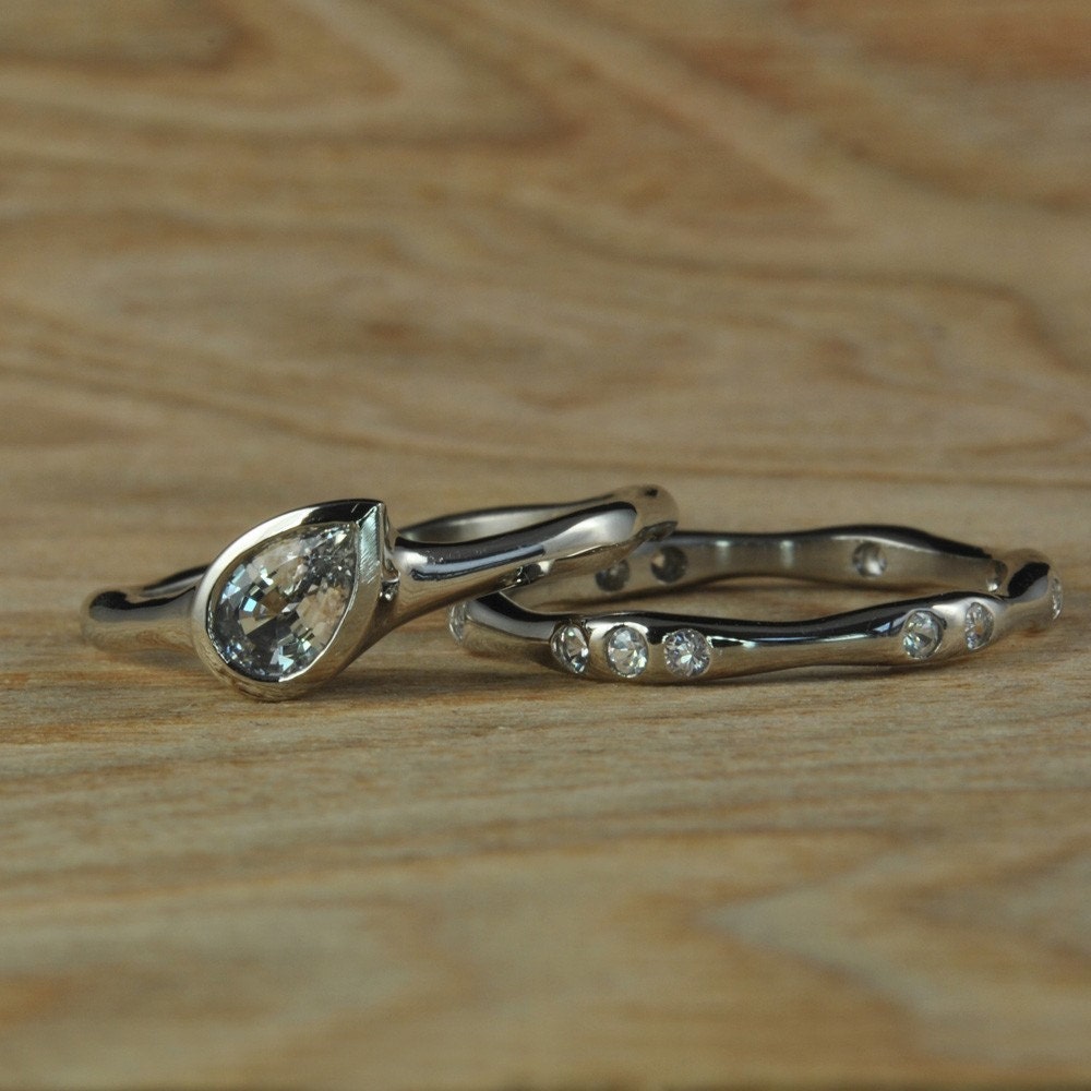 Moissanite Solitaire and Water Ring Set