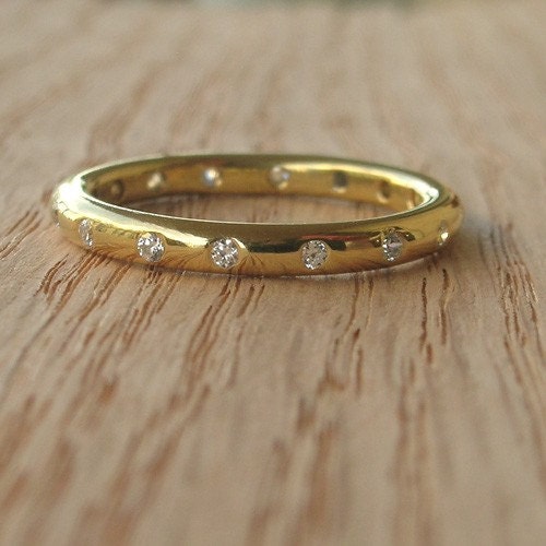 Moissanite and Gold Eternity Band
