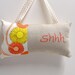 nursery doorknob pillow- ''Shhh'' hand embroidered on linen- with coral and yellow flowers