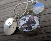 Mixed-media necklace- soldered butterfly charm, hand stamped fly charm and lovely moonstone dropdrop