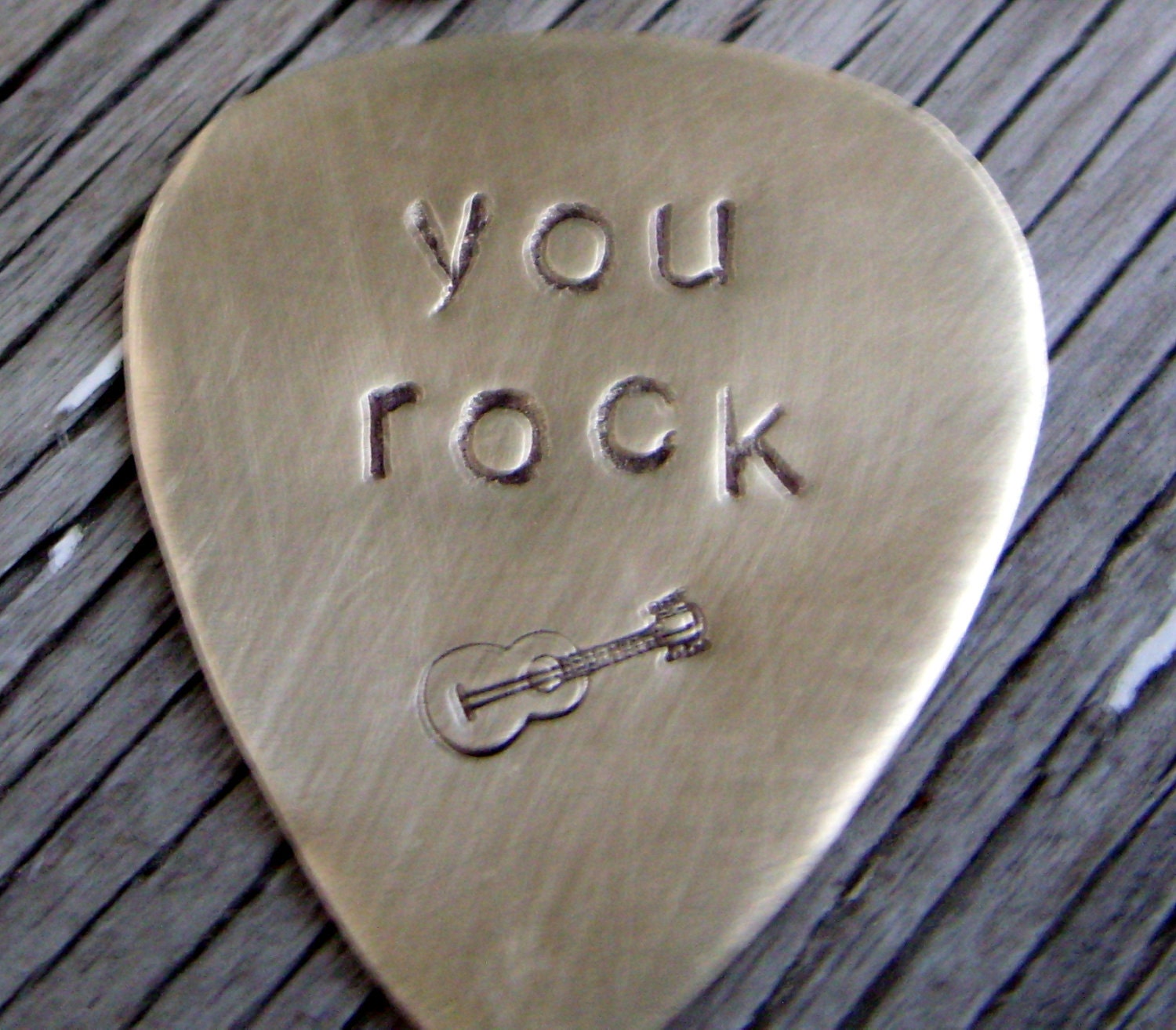 Hand stamped brass guitar pick- custom gift for a cool musician