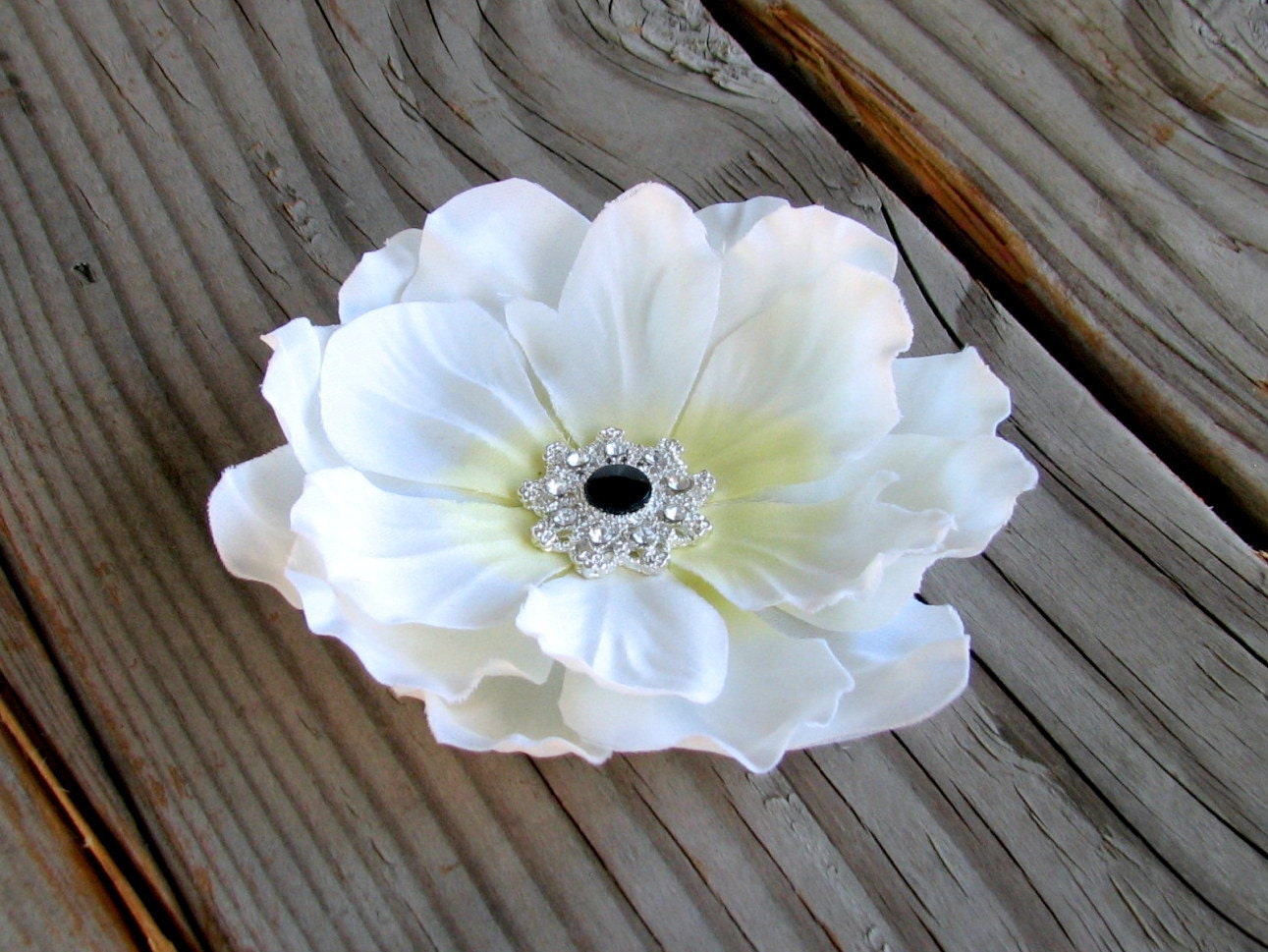 White Anemone Flower Fascinator Hair Clip with a Black Rhinestone Set in Silver Center