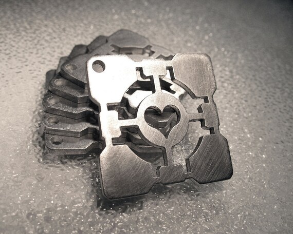 Pendant to honor your lost Weighted Companion Cube