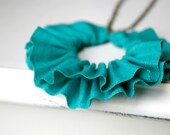 linen ruffle necklace in seafoam green. antique bronze chain.