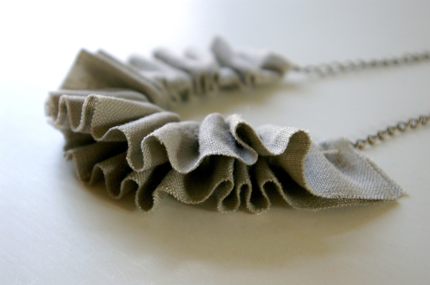 linen ruffle necklace in grey. antique bronze chain.