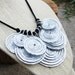Silver. Aluminum. Spiral. Disc. Bib. Necklace.