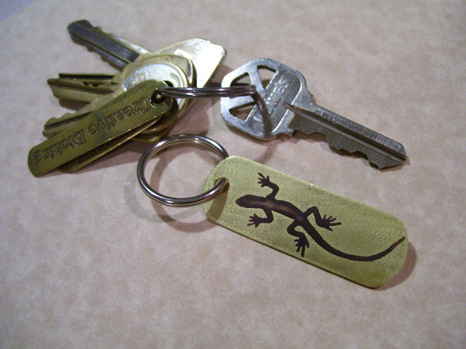 lizard etched brass keychain