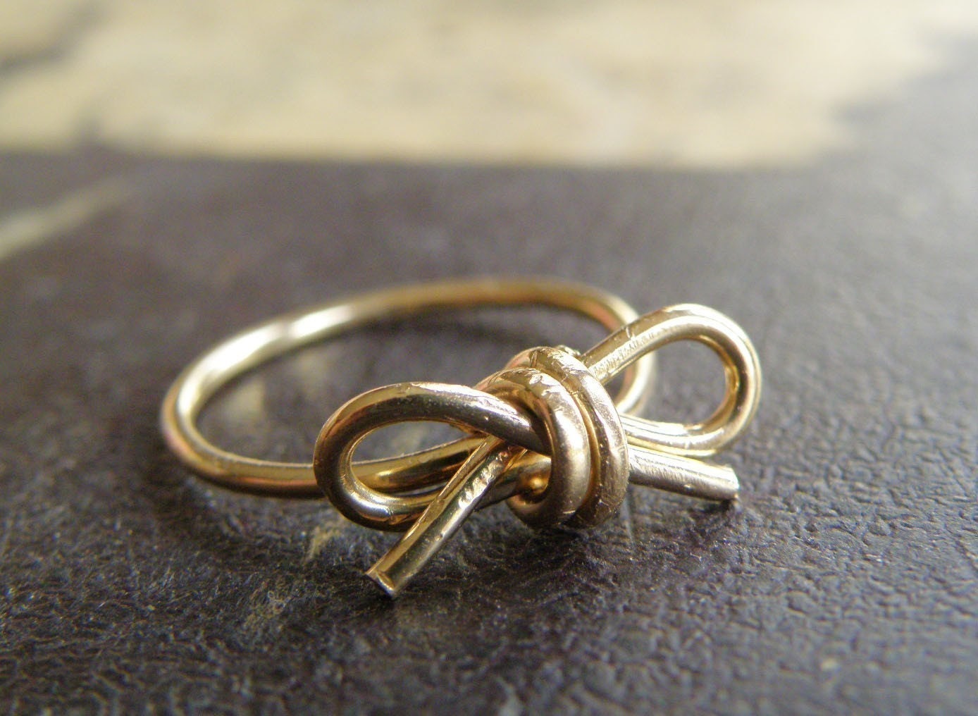 DON'T FORGET. 14 K gold filled wire bow  ring in your size