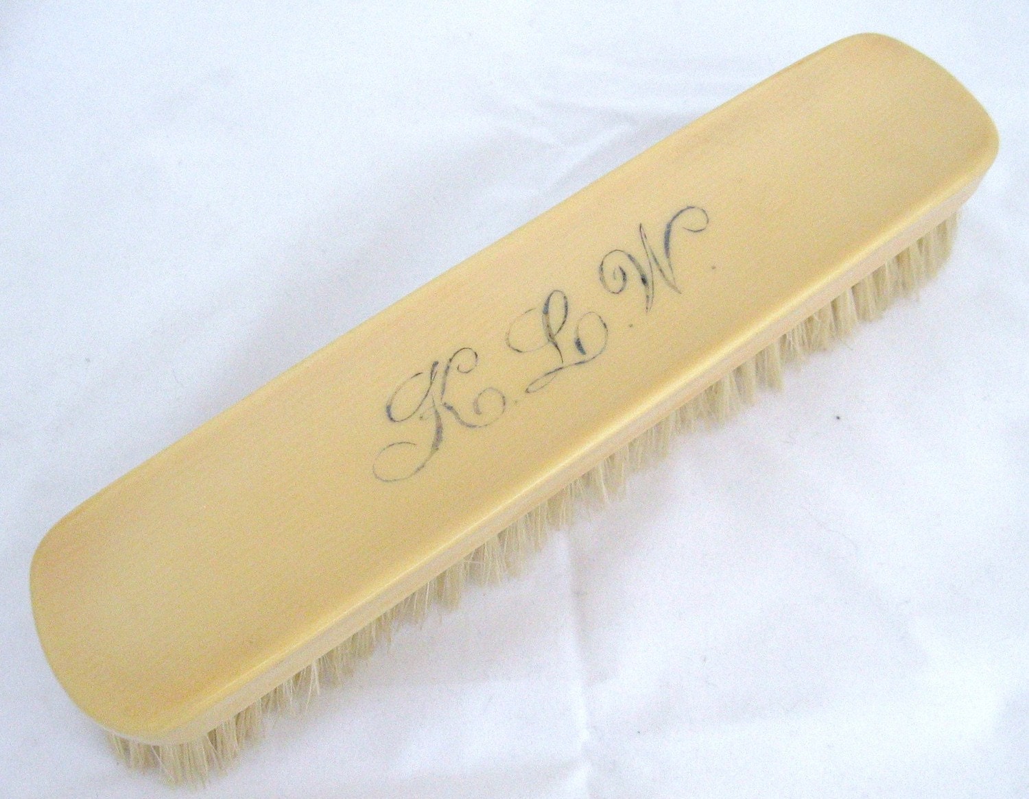 Vintage celluloid lint brush