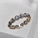 Blue sapphire endless bezel ring - 18k gold