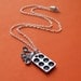 Loves to Bake Cupcakes Pewter Charm Necklace- with antiqued muffin tin miniature measuring spoons and silver chain