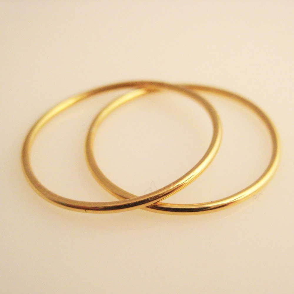 Duet , two 18K Gold 1mm bands