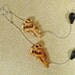 Climbing Skeletons Shoulder Dusting Earrings bone silver black
