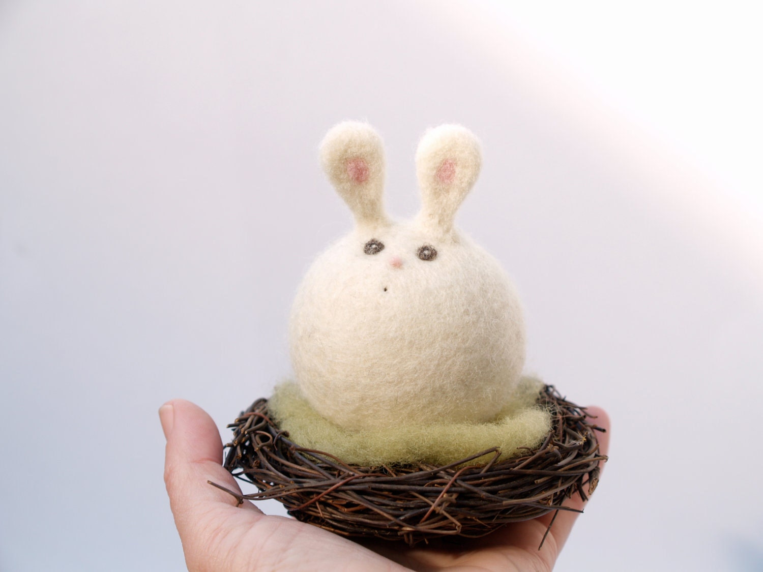 Easter Bunny Toy sitting on her nest . Very sweet and VERY cute . Needle Felted Wool
