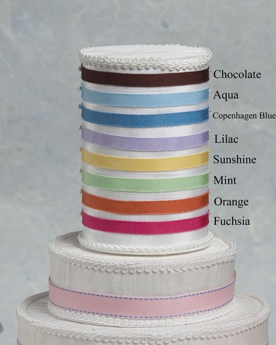 Adorable Leg Pop Ribbon Accent Cake Topper