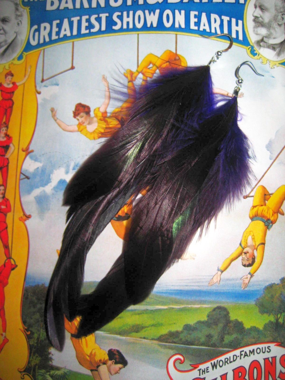 The Juliet hand made feathered earrings by Love Charlie with lusciously lengthy Purple schlappen