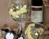Hand painted wine glass in a school bus yellow wrap around design. Dishwasher safe