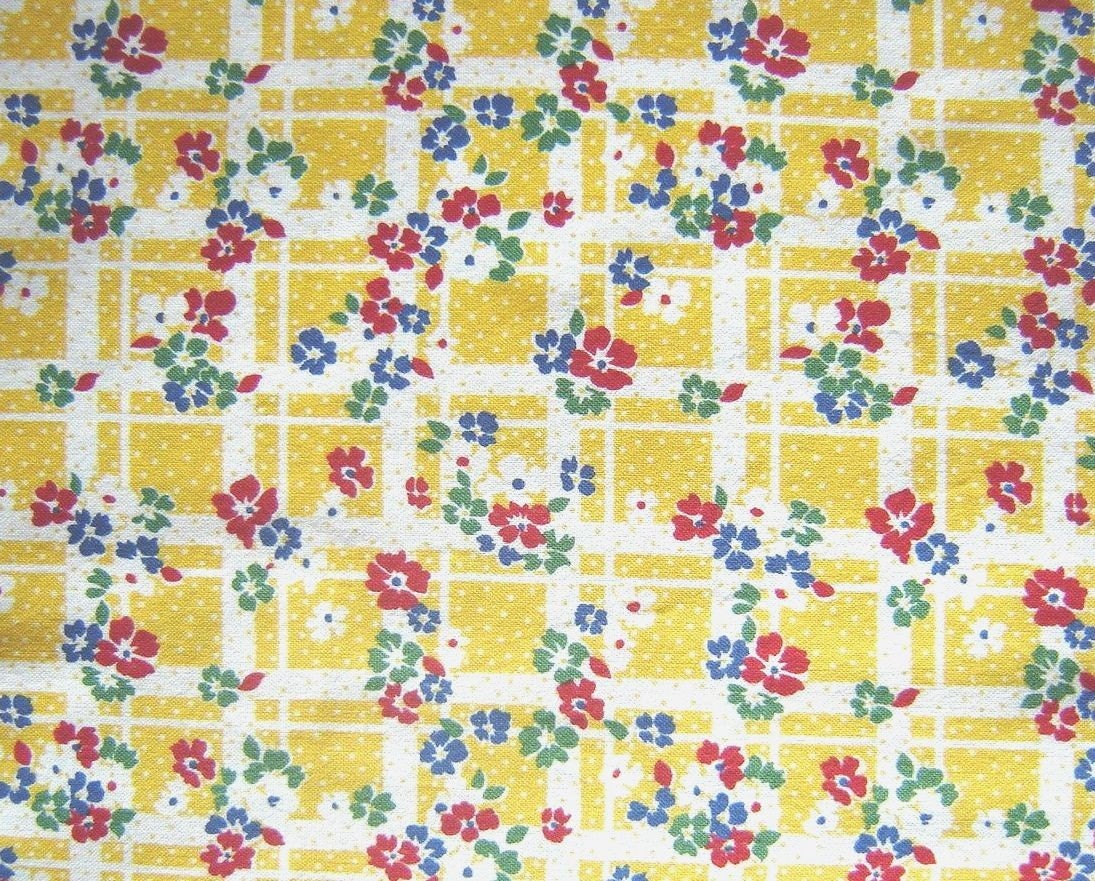 geometric with flowers on yellow and white cotton fabric 53 inches
