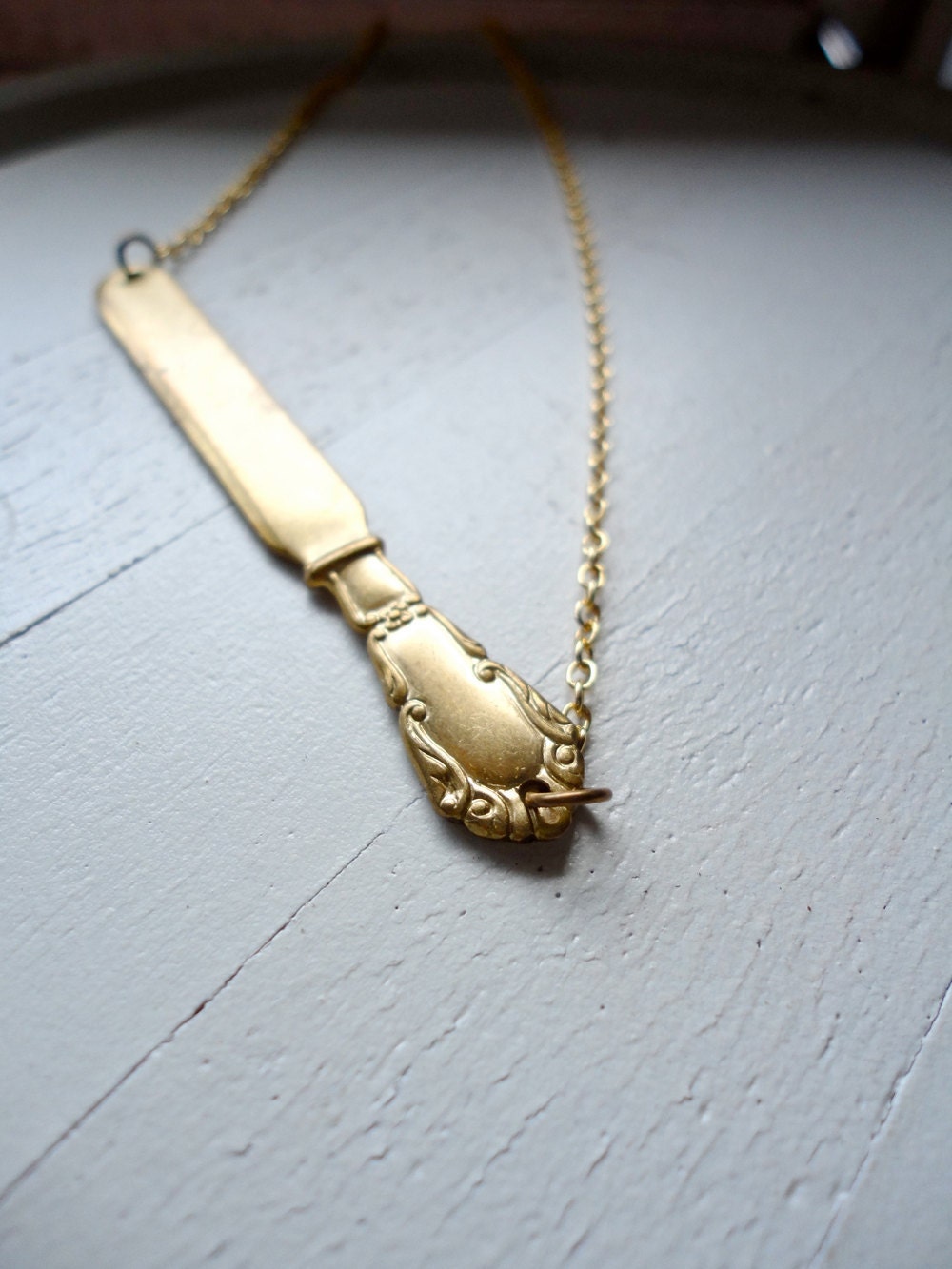 golden knife necklace