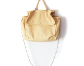 JALI in nude leather and chain