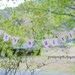 It's A Girl - Pink and Brown Onesie Clothesline Banner perfect for baby shower, party, or maternity photo prop