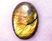 124 CTS ...............Labradorite Cabochon............ 46 X 32 X  8 MM