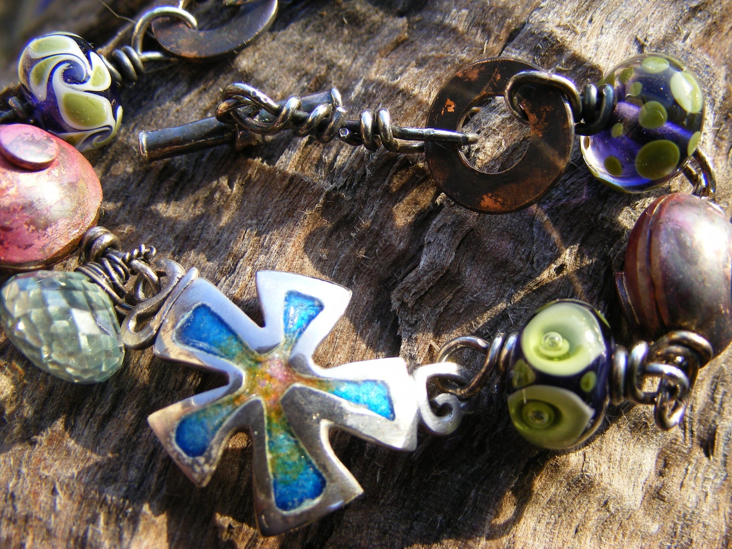 Earth Star.-Oxidised silver bracelet with lampwork and copper beads.