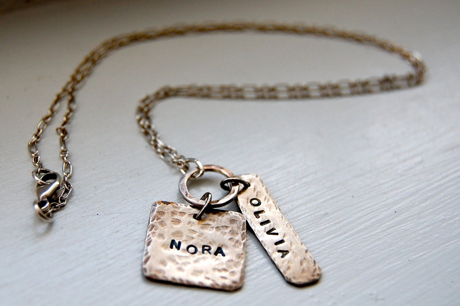 Two Name Handstamped Necklace on Silver Ring