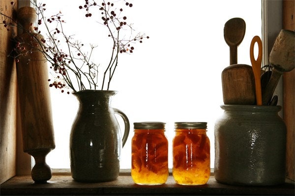 Marmalade - rustic farm scene with jars of orange marmalade.
