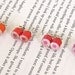 color pencil ear studs, the orange, magenta and red series