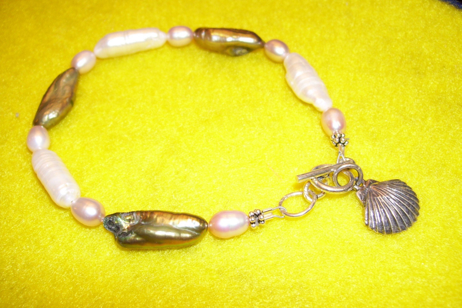 BRACELET - gray and white stick pearls, rice pearls, lever back earwire, shell, toggle