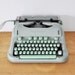 Vintage Hermes 3000 typewriter with case, swiss designed