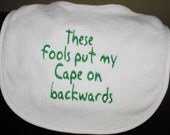 Embroidered Bib for Baby-These Fools Put my Cape on Backwards- White with colored font